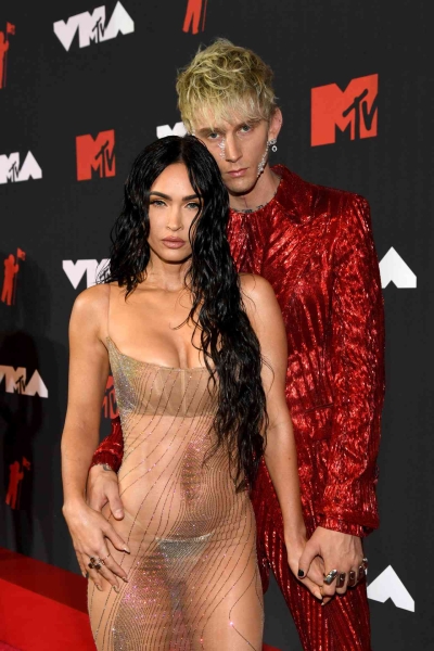 Megan Fox revealed she had a miscarriage with her and Machine Gun Kelly's baby in her new poetry book, 'Pretty Boys Are Poisonous.'