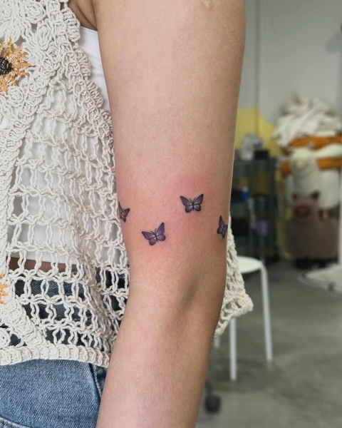 Tiny tattoos are trending in a major way, allowing fans to adorn themselves in a collage of delicate designs—or just one teeny tiny design. Scroll through these 25 tiny tattoos for inspiration.