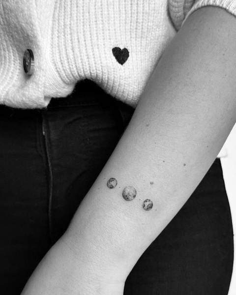 Tiny tattoos are trending in a major way, allowing fans to adorn themselves in a collage of delicate designs—or just one teeny tiny design. Scroll through these 25 tiny tattoos for inspiration.