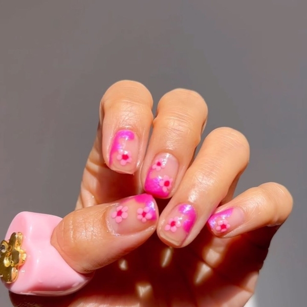 Short nails just make more sense for summer. From graphic designs to cool embellishments, find over a dozen short summer nail ideas for the months ahead here.