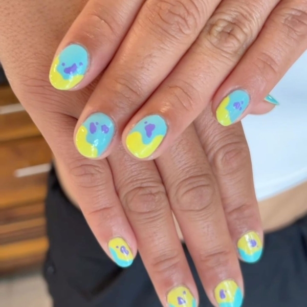 Short nails just make more sense for summer. From graphic designs to cool embellishments, find over a dozen short summer nail ideas for the months ahead here.