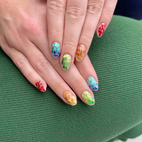 Short nails just make more sense for summer. From graphic designs to cool embellishments, find over a dozen short summer nail ideas for the months ahead here.