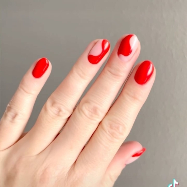 Short nails just make more sense for summer. From graphic designs to cool embellishments, find over a dozen short summer nail ideas for the months ahead here.