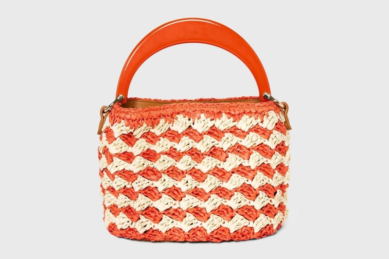 Target’s new arrivals section is brimming with affordable handbags that look so much more expensive than they are. A shopping writer is eyeing these 13 luxe-looking styles, including beach bags, bucket bags, and more under $35.