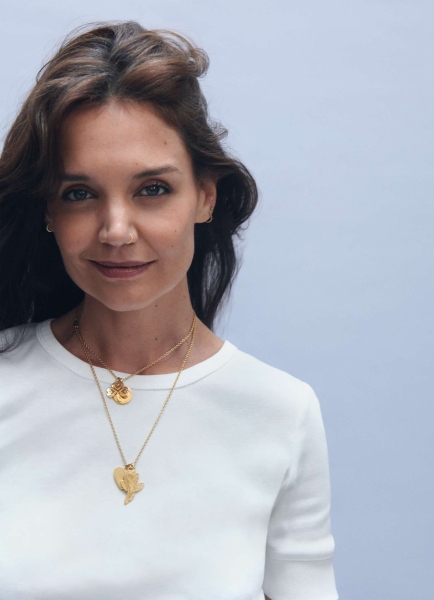 Katie Holmes posed topless to promote her latest fashion collaboration with A.P.C. See the campaign imagery here.