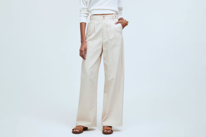 Look of the Day for June 6, 2024 features Katie Holmes in comfortable trousers and strappy Mary Jane flats. Shop similar pieces perfect for airport travel at Amazon, Nordstrom, and Madewell.