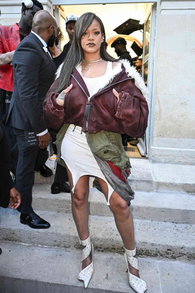 Rihanna showed her support at partner A$AP Rocky's debut fashion show during Paris Fashion Week while debuting a brand-new hairstyle in the front row.