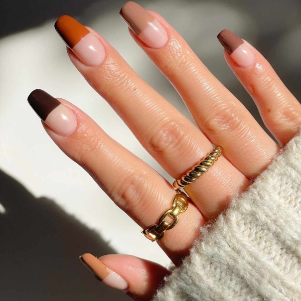 While classic pink and white French manis are making a comeback, brown French tip nails offer an updated take on the classic look. Here, find a dozen brown french tip nail looks for inspiration.