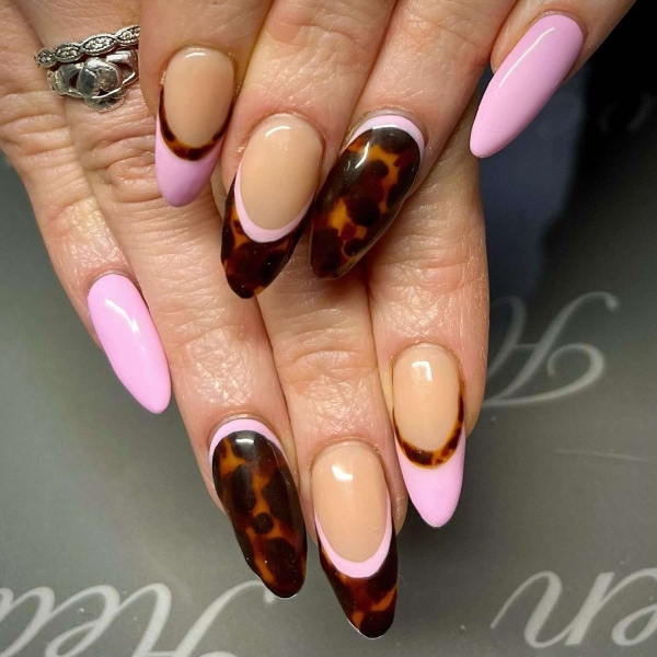 While classic pink and white French manis are making a comeback, brown French tip nails offer an updated take on the classic look. Here, find a dozen brown french tip nail looks for inspiration.