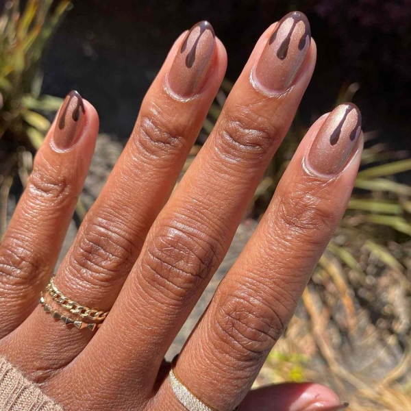 While classic pink and white French manis are making a comeback, brown French tip nails offer an updated take on the classic look. Here, find a dozen brown french tip nail looks for inspiration.