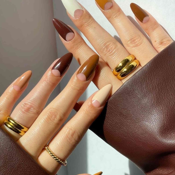 While classic pink and white French manis are making a comeback, brown French tip nails offer an updated take on the classic look. Here, find a dozen brown french tip nail looks for inspiration.