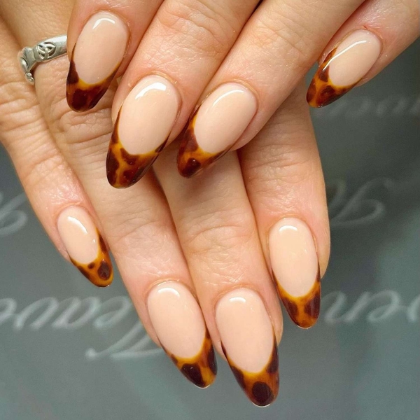 While classic pink and white French manis are making a comeback, brown French tip nails offer an updated take on the classic look. Here, find a dozen brown french tip nail looks for inspiration.