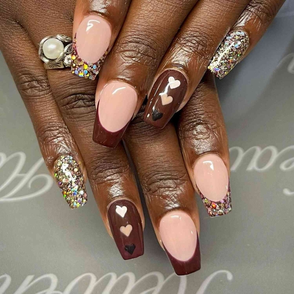 While classic pink and white French manis are making a comeback, brown French tip nails offer an updated take on the classic look. Here, find a dozen brown french tip nail looks for inspiration.