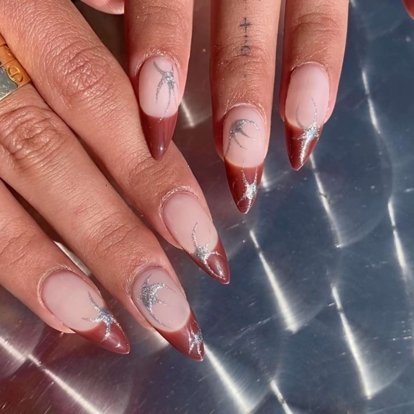 While classic pink and white French manis are making a comeback, brown French tip nails offer an updated take on the classic look. Here, find a dozen brown french tip nail looks for inspiration.