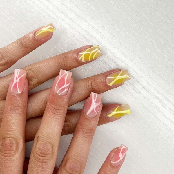 Aura nails are the gradient design that's slowly but surely overpowering the tried-and-true ombré. Browse 20 stunning options, here.