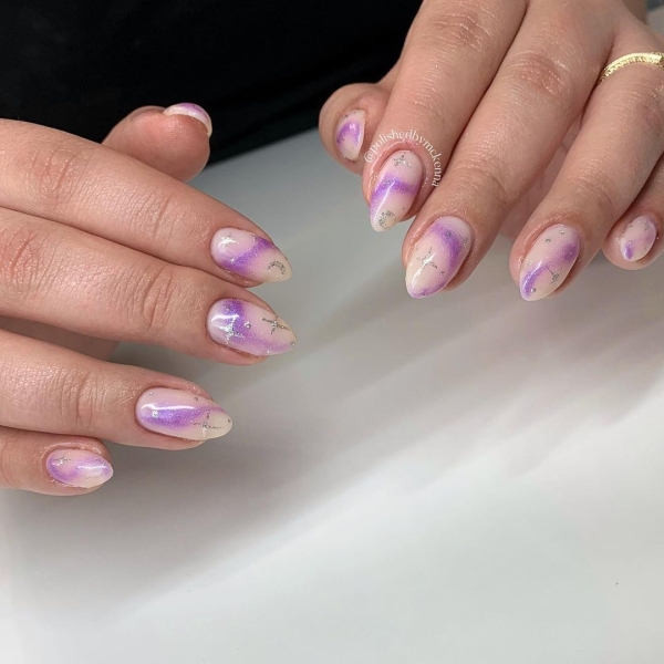 Aura nails are the gradient design that's slowly but surely overpowering the tried-and-true ombré. Browse 20 stunning options, here.