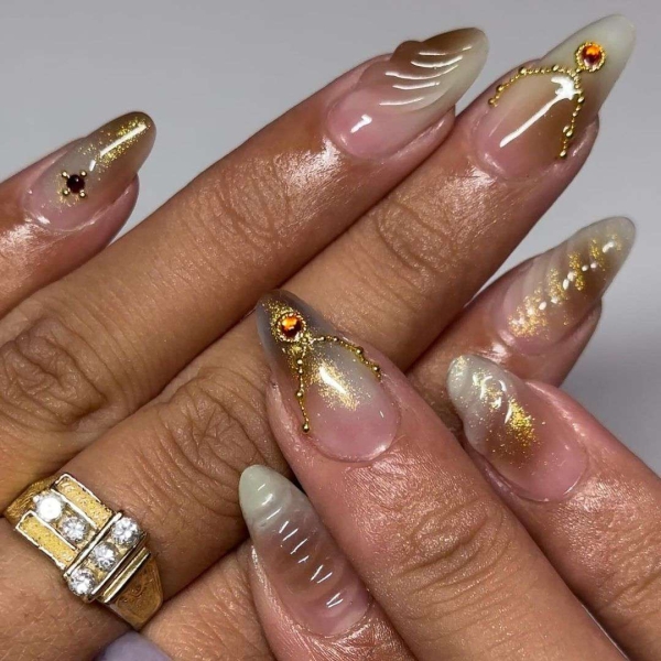 Aura nails are the gradient design that's slowly but surely overpowering the tried-and-true ombré. Browse 20 stunning options, here.