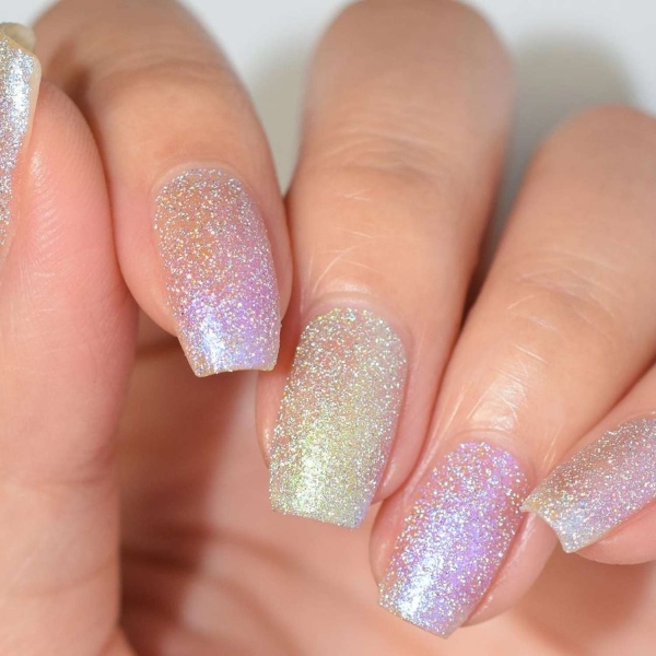 Birthdays are a time for celebration, making color and creativity par for the course. Here, explore over a dozen fun birthday nail ideas that fit the bill.