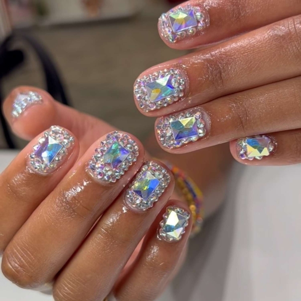 Birthdays are a time for celebration, making color and creativity par for the course. Here, explore over a dozen fun birthday nail ideas that fit the bill.