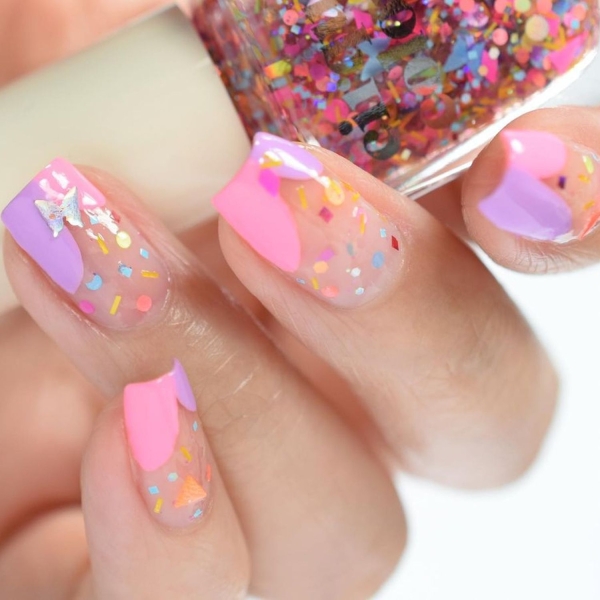 Birthdays are a time for celebration, making color and creativity par for the course. Here, explore over a dozen fun birthday nail ideas that fit the bill.