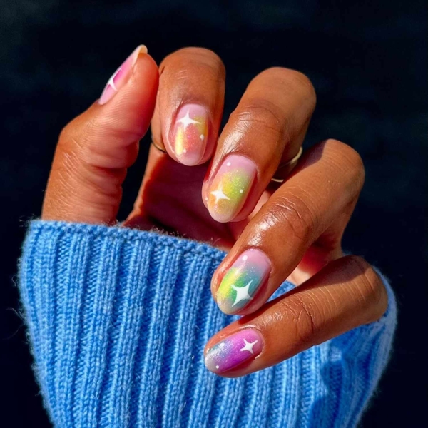 Birthdays are a time for celebration, making color and creativity par for the course. Here, explore over a dozen fun birthday nail ideas that fit the bill.