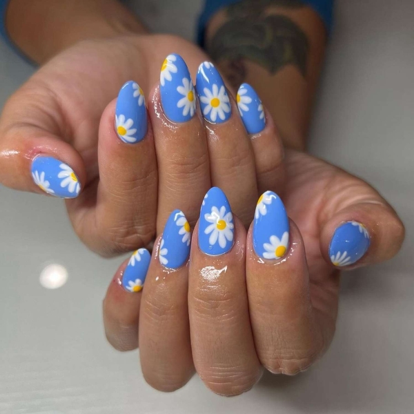 Blue nail designs are popular year-round for their fresh and cool vibe. Here, discover 20 blue nail designs to recreate at home with tips from pro nail artists.