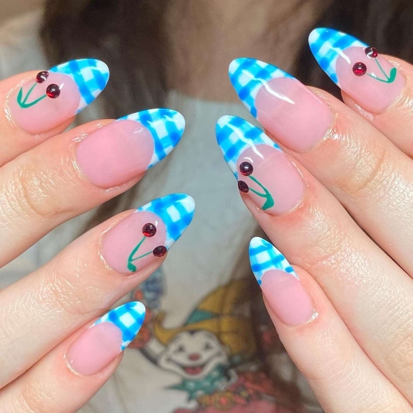 Blue nail designs are popular year-round for their fresh and cool vibe. Here, discover 20 blue nail designs to recreate at home with tips from pro nail artists.