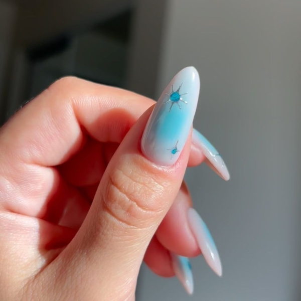 Blue nail designs are popular year-round for their fresh and cool vibe. Here, discover 20 blue nail designs to recreate at home with tips from pro nail artists.