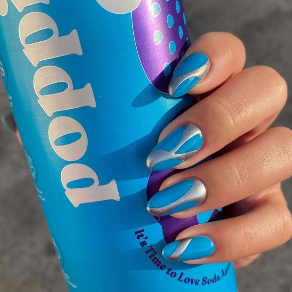 Blue nail designs are popular year-round for their fresh and cool vibe. Here, discover 20 blue nail designs to recreate at home with tips from pro nail artists.