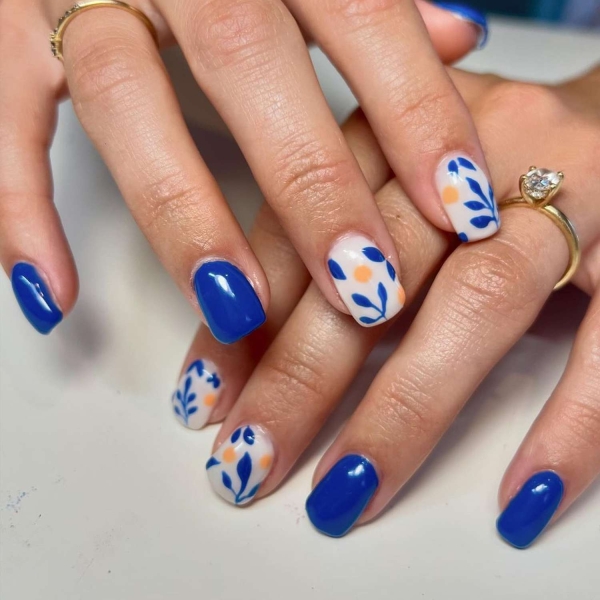 Blue nail designs are popular year-round for their fresh and cool vibe. Here, discover 20 blue nail designs to recreate at home with tips from pro nail artists.