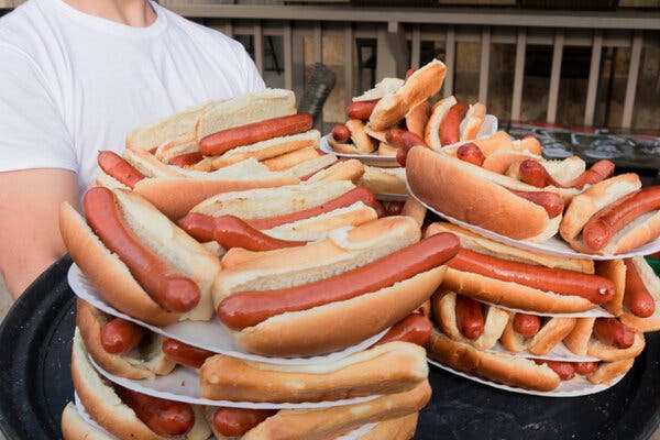 Competitive Eaters Are Just Like Us. Give or Take a Dozen Hot Dogs.