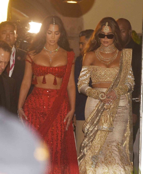 Kim Kardashian attended Anand Ambani and Radhika Merchant's Indian wedding in a rule-breaking wedding guest look. See what she wore here.