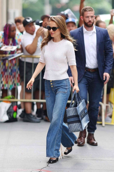 On Monday, the actress was spotted walking into a taping of The View, wearing a white knit three-quarter sleeve top with popcorn embellishments, which she paired with wide-leg jeans and black Mary Jane shoes.