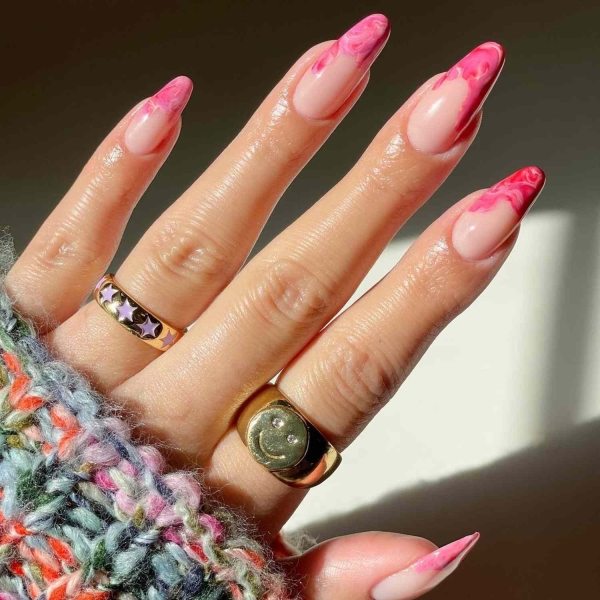 Pink ombre nails are trending for summer 2024. Here, explore our favorite pink ombre nail designs.