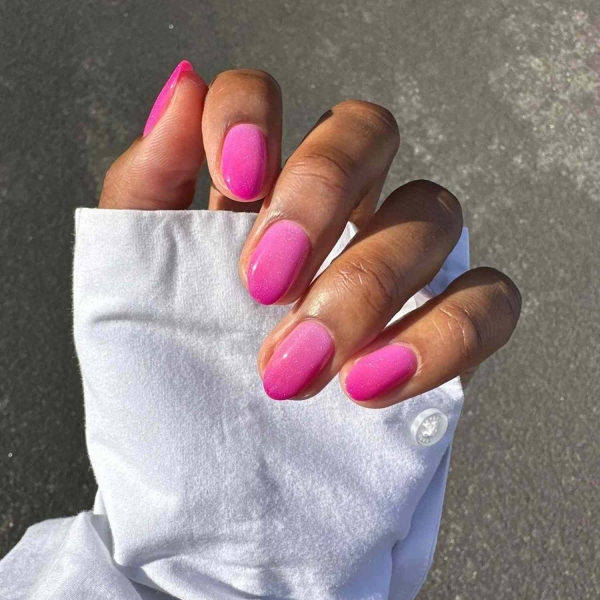 Pink ombre nails are trending for summer 2024. Here, explore our favorite pink ombre nail designs.