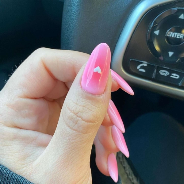 Pink ombre nails are trending for summer 2024. Here, explore our favorite pink ombre nail designs.