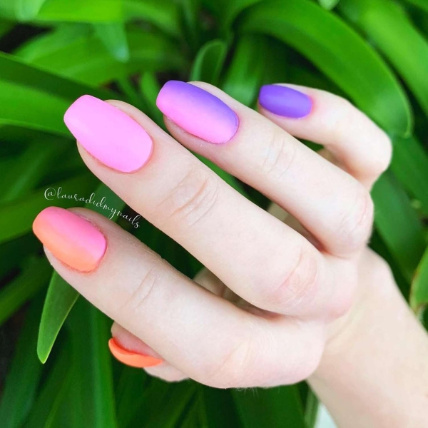 Pink ombre nails are trending for summer 2024. Here, explore our favorite pink ombre nail designs.