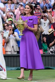 Royal insiders explained all the special Easter eggs and significant messages in Kate Middleton's purple Safiyaa dress at Wimbledon.