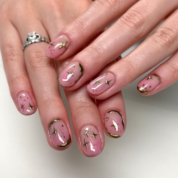 An eye-catching manicure is the perfect choice to sport during Leo season. Think: Bright pinks, shiny chromes, and loads of texture.