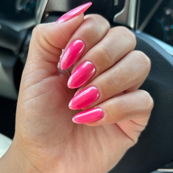 An eye-catching manicure is the perfect choice to sport during Leo season. Think: Bright pinks, shiny chromes, and loads of texture.