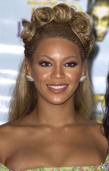 Beyoncé's braid looks are an aesthetic hallmark of her career, the plaits evolving along with the singer's own style. Here are 15 of our favorite.