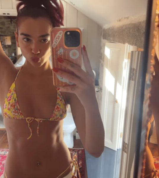 Dua Lipa shared photos from her latest vacation, in which she wore two tiny string bikinis.