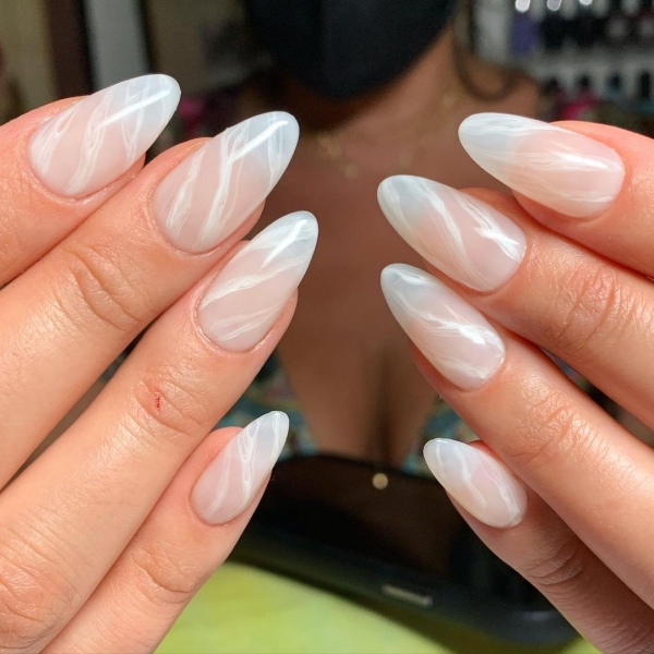 From elegant neutrals to bold patterns, find inspiration for your next salon visit with these stunning oval nail designs. The shape is a blend of almond and round nails.