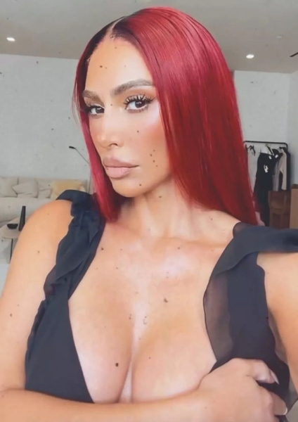 Kim Kardashian showed off a new red hair look on Instagram Stories. See the transformation, here.