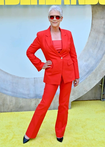 Look of the Day for August 7, 2024 features Jamie Lee Curtis in a matching red suit with black, pointed-toe heels. Shop the unfussy heels everyone should have from Steve Madden, Sam Edelman, and M.Gemi.