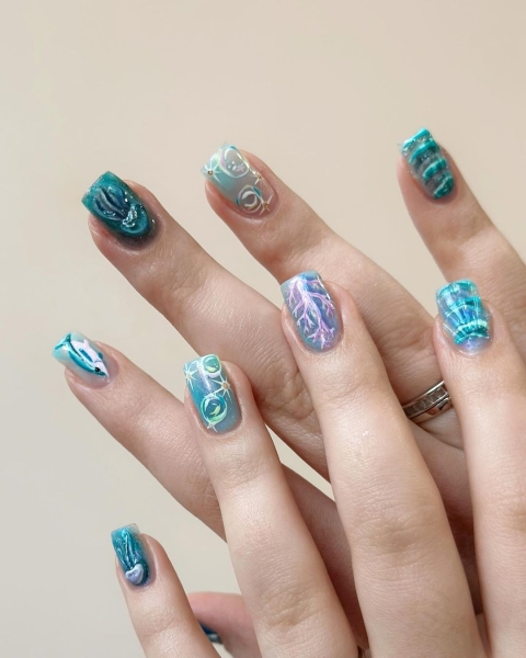 Take a page out of Cynthia Erivo's book and don a "Wicked"-themed manicure, adorned with loads of sparkle, texture, and creativity.