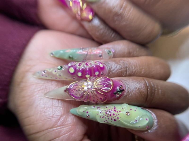 Take a page out of Cynthia Erivo's book and don a "Wicked"-themed manicure, adorned with loads of sparkle, texture, and creativity.