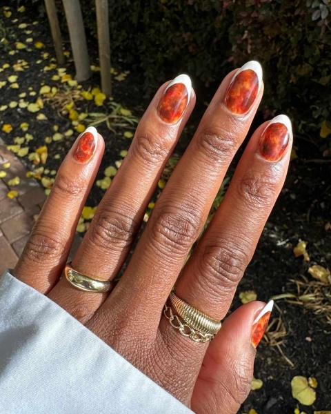 With the promise of a crisp, cool autumn right around the corner, there is no better time to change up your nail routine. Swipe through 40 stunning French nail ideas for fall.