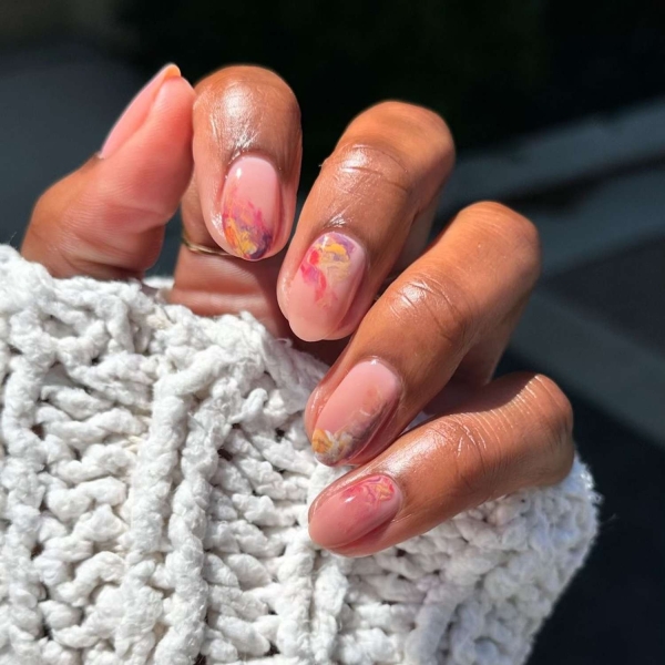 You don't need long nails to lean into the autumn season. Here, scroll through 20 short fall nail ideas that tap into everything we love about this time of year.