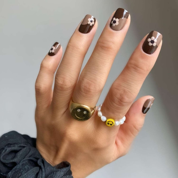 You don't need long nails to lean into the autumn season. Here, scroll through 20 short fall nail ideas that tap into everything we love about this time of year.